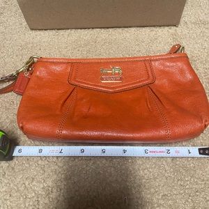 Coach wristlet burnt orange